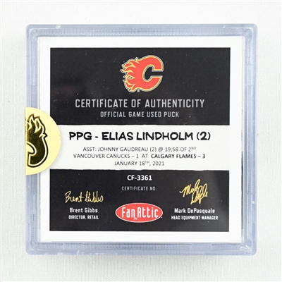 Elias Lindholm - Calgary Flames - Goal Puck - (Rare TRACKING PUCK) January 18, 2021 vs. Vancouver Canucks (NHL Logo)