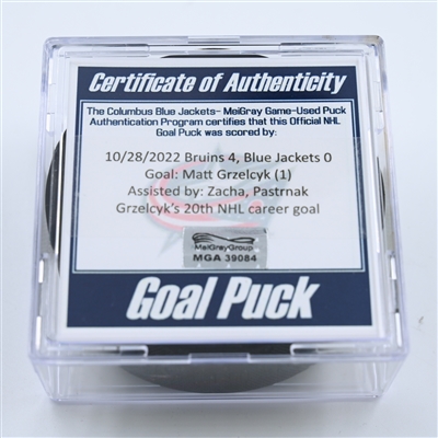 Matt Grzelcyk - Boston Bruins - Goal Puck - October 28, 2022 vs. Columbus Blue Jackets (Blue Jackets Logo)  - 2022-23 NHL Season